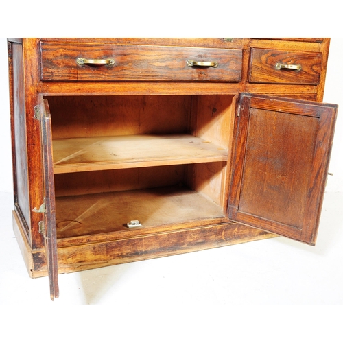 663 - A vintage 20th century oak kitchen larder pantry cabinet. Of rectangular form with a configuration o... 