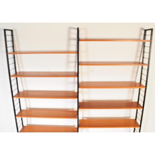 664 - A vintage mid 20th century Ladderax wall unit. Total of three bays with twelve teak shelves, ebonise... 