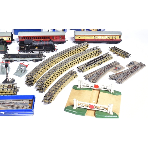 109 - Model Railway - a collection of vintage Hornby Dublo OO gauge trainset rolling stock, trackside acce... 