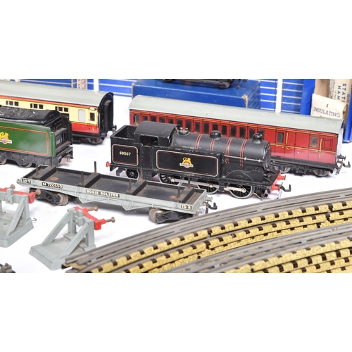 109 - Model Railway - a collection of vintage Hornby Dublo OO gauge trainset rolling stock, trackside acce... 