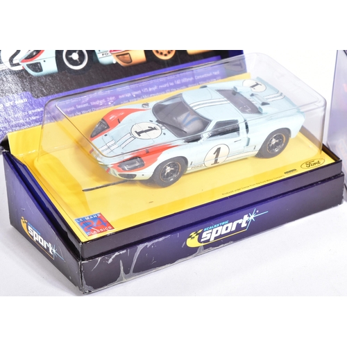 122 - Scalextric - a collection of x3 Hornby made slot car racing cars comprising; C2464A Ford GT MKII 196... 