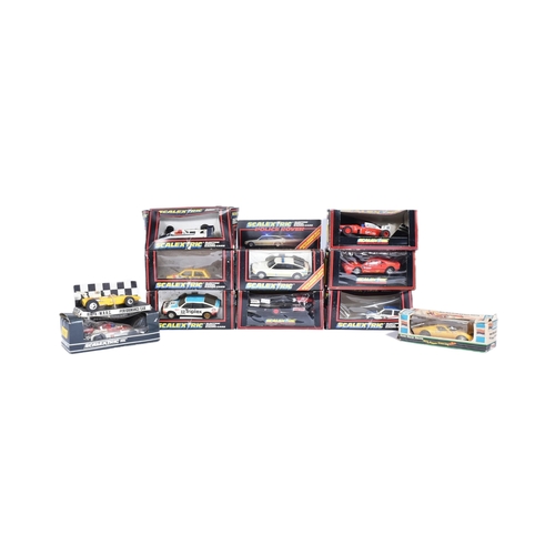 161 - Scalextric - a collection of x10 assorted vintage Scalextric slot car racing cars to include; C2016 ... 