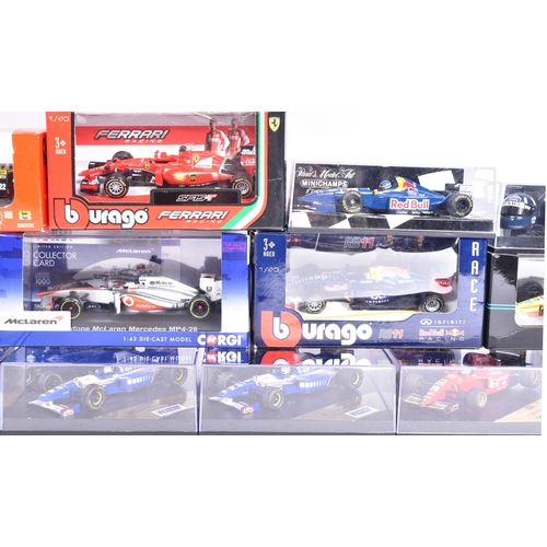 165 - Diecast - a collection of assorted diecast model racing cars of Formula One and Rally interest by ma... 