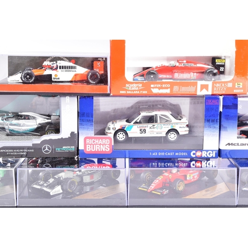 165 - Diecast - a collection of assorted diecast model racing cars of Formula One and Rally interest by ma... 