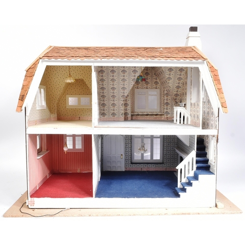 175 - Doll's House - a 20th century Mock Tudor style manor / country house dolls house. Four rooms, with a... 