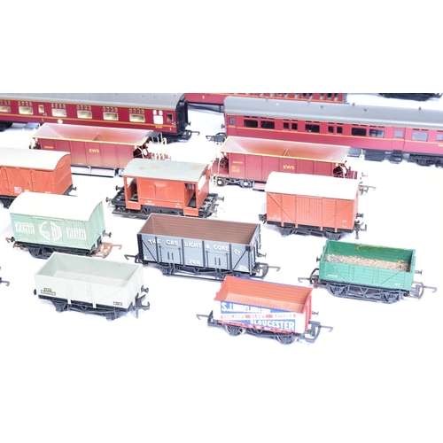 195 - Model Railway - an assortment of Hornby OO gauge wagons and carriages, to include: x3 R6846 EWS Seac... 