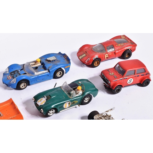 205 - Scalextric - a collection of x11 vintage Triang / Hornby Scalextric slot car racing cars. Examples t... 