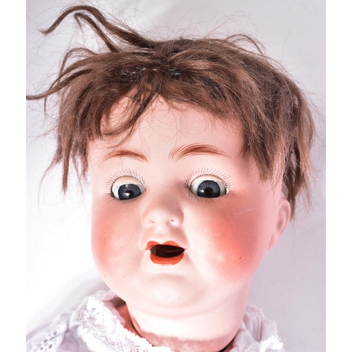 229 - An early 20th Century German ABG ( Alt Beck & Gottschalck ) bisque headed character baby doll. The d... 