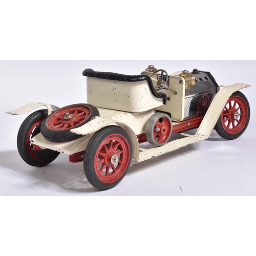 232 - Live Steam - an original vintage Mamod steam car model No. SA1 ' Cream Steam Roadster '. A solid fue... 