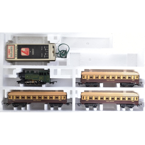 242 - Model Railway - two vintage Lima OO gauge locomotive trainsets. Comprising of: No. 149704, Leopold m... 