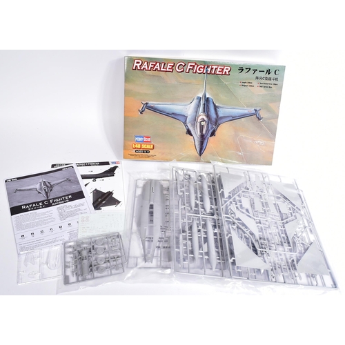 253 - Model Kits - x3 fighter aircraft model kits of varying scales. To include: Hobby Boss Rafale C Fight... 