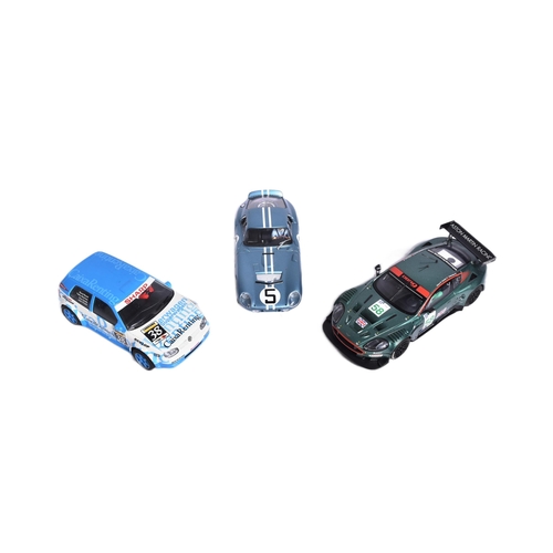 257 - Scalextric - x3 assorted Scalextric slot car racing cars comprising; Hornby Aston Martin DBR9, Ninco... 