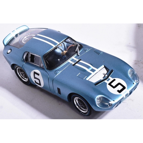 257 - Scalextric - x3 assorted Scalextric slot car racing cars comprising; Hornby Aston Martin DBR9, Ninco... 