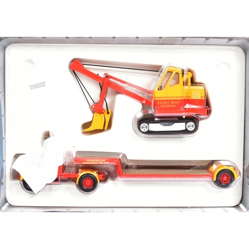 295 - Diecast - a collection of x4 Corgi diecast haulage and construction vehicles comprising; Wimpey Scam... 