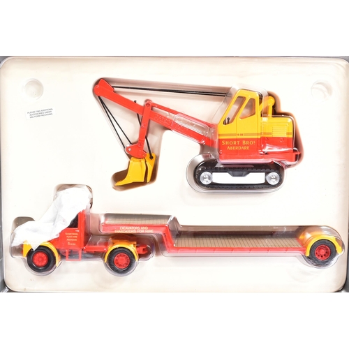 295 - Diecast - a collection of x4 Corgi diecast haulage and construction vehicles comprising; Wimpey Scam... 