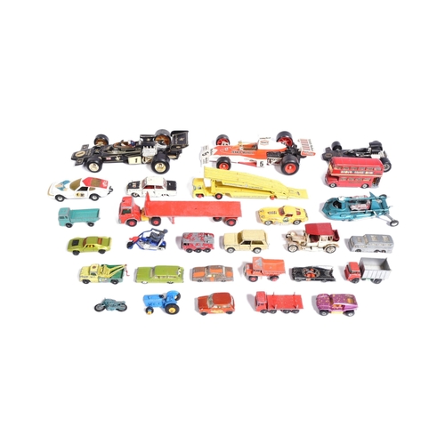 309 - Diecast - a collection of vintage unboxed diecast model cars to include; Corgi 1/18 John Player Spec... 