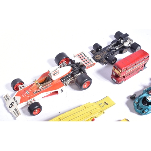 309 - Diecast - a collection of vintage unboxed diecast model cars to include; Corgi 1/18 John Player Spec... 