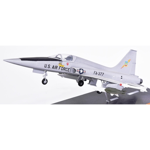 319 - Collection of x3 aeroplane models, to include a built model kit of a Belgium Alpha Jet B, a built mo... 