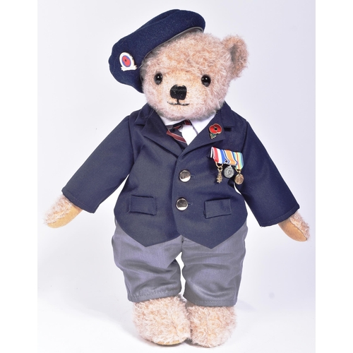 330 - Teddy Bears - a Limited Edition Merrythought Royal British Legion Centenary bear. The mohair teddy b... 