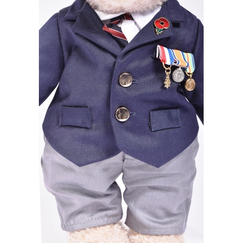 330 - Teddy Bears - a Limited Edition Merrythought Royal British Legion Centenary bear. The mohair teddy b... 