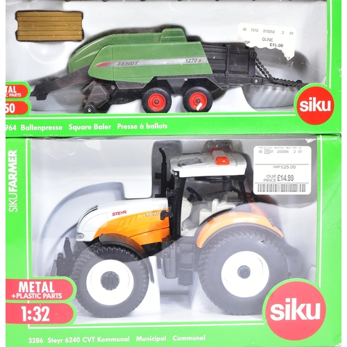 421 - Diecast - a collection of Siku diecast farm models to include; 5601 Startset Farmer, 1983 New Hollan... 