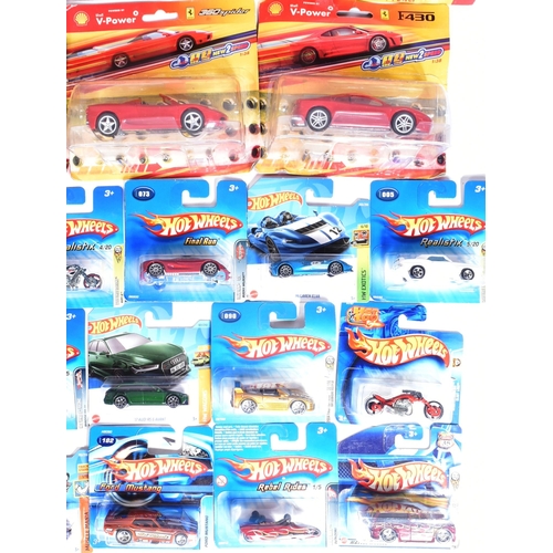 425 - Diecast - a collection of assorted early 2000s Mattel made HotWheels carded diecast models along wit... 