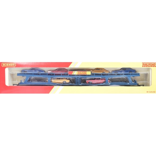 44 - Model Railway - three vintage Hornby OO gauge railroad trainsets, comprising of; R8263 Car Unloading... 