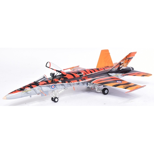 455 - Model Kits - a collection of x5 built model kits of aircraft interest, comprising of; a BAE Hawk 100... 