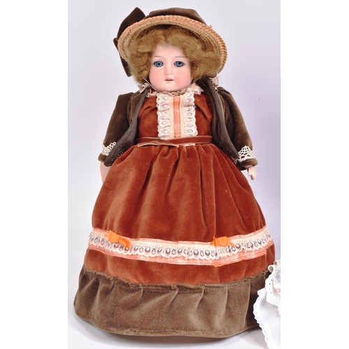 462 - Two vintage German made bisque headed dolls. One an early 20th Century Carl Hamus example, the other... 