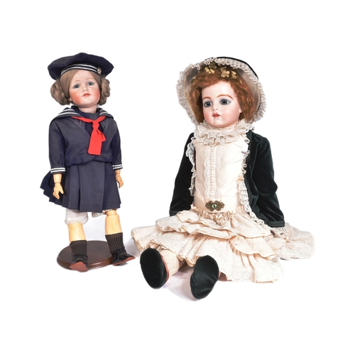 467 - Two early 20th Century style reproduction dolls comprising a large French Bru doll and a smaller Ger... 