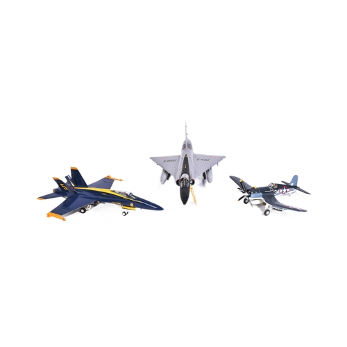 469 - Model kits - a collection of x3 built model kits of aircraft interest, comprising of; a Dassault Mir... 