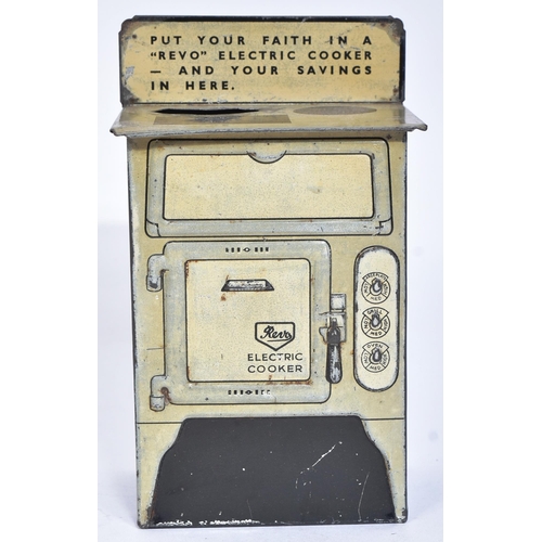 476 - Tinplate Toys - a vintage litho printed tinplate money box in the form of an electric ' Revo ' stove... 