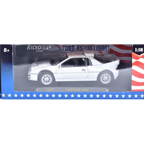 492 - Diecast - x2 1/18 scale diecast model cars comprising; Ricko Ford RS200 (1986) and Gateway Peugeot 4... 