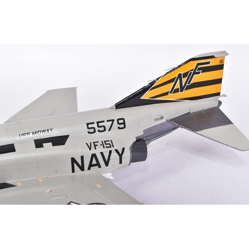 511 - Models - a scale plastic model of a US Navy Fantom F-4 5579 USS Midway jet, in grey, with black and ... 