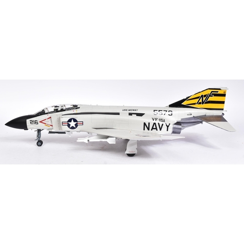 511 - Models - a scale plastic model of a US Navy Fantom F-4 5579 USS Midway jet, in grey, with black and ... 