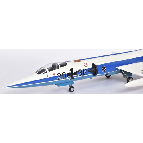 513 - Models - x2 scale plastic models of Lockheed Fighter Jets - one in red Italian livery, the other in ... 