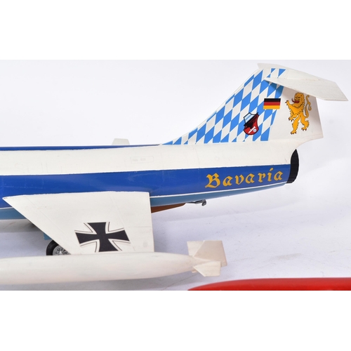 513 - Models - x2 scale plastic models of Lockheed Fighter Jets - one in red Italian livery, the other in ... 