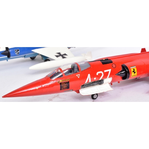 513 - Models - x2 scale plastic models of Lockheed Fighter Jets - one in red Italian livery, the other in ... 