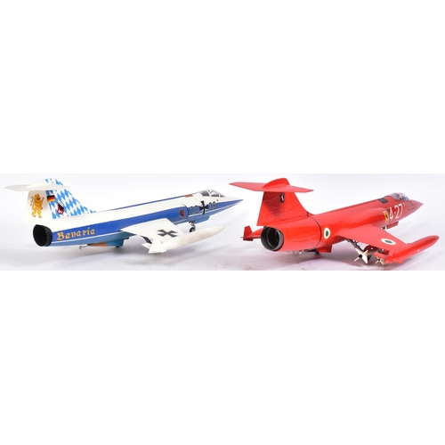 513 - Models - x2 scale plastic models of Lockheed Fighter Jets - one in red Italian livery, the other in ... 