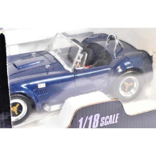 515 - Diecast - x2 1/18 scale diecast model cars comprising Kyosho Shelby Cobra  and Revell Auto Union Typ... 