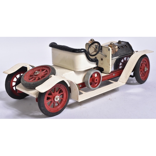 52 - Live Steam - an original vintage Mamod steam car model No. SA1 ' Cream Steam Roadster '. A solid fue... 