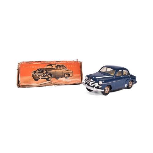 54 - An original vintage 1950s Victory Industries battery operated model car of a Vauxhall Velox. Plastic... 