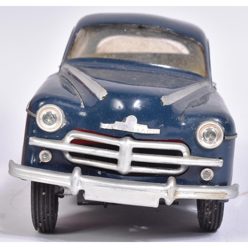 54 - An original vintage 1950s Victory Industries battery operated model car of a Vauxhall Velox. Plastic... 