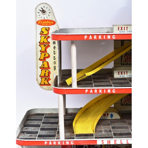 6 - Tinplate Toys - vintage 1950s Mettoy tinplate lithographed three tier Skypark garage. Plastic access... 