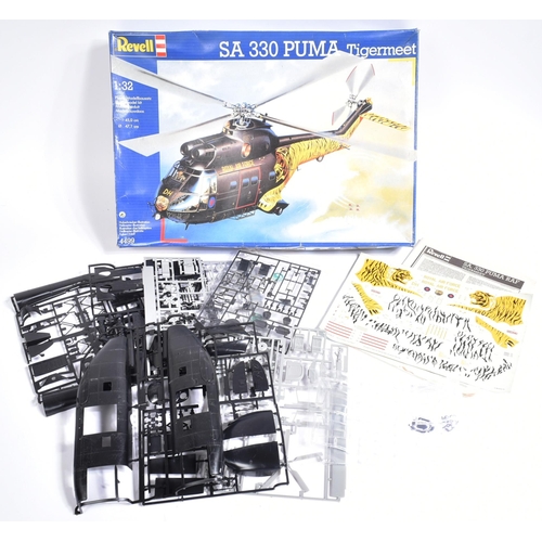 63 - Model Kits - a collection of x3 Revell made 1/32 scale plastic model kits of military and aviation i... 