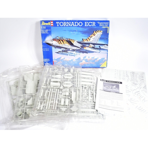 63 - Model Kits - a collection of x3 Revell made 1/32 scale plastic model kits of military and aviation i... 