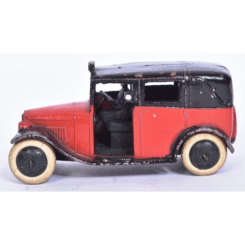 7 - Dinky - 36G Taxi With Driver - an early c1930s pre-war diecast Dinky Toy model of a Taxi in maroon w... 