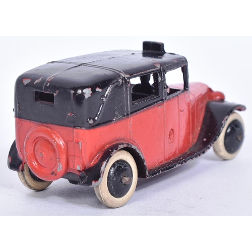 7 - Dinky - 36G Taxi With Driver - an early c1930s pre-war diecast Dinky Toy model of a Taxi in maroon w... 