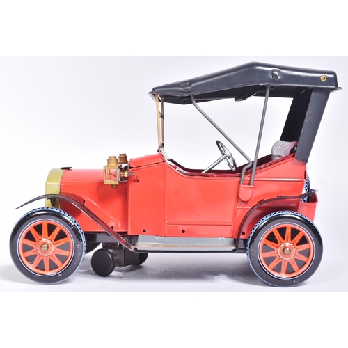 9 - Tinplate Toys - a vintage Japanese (Nomura) made tinplate battery operated model '  Veteran Car '. T... 