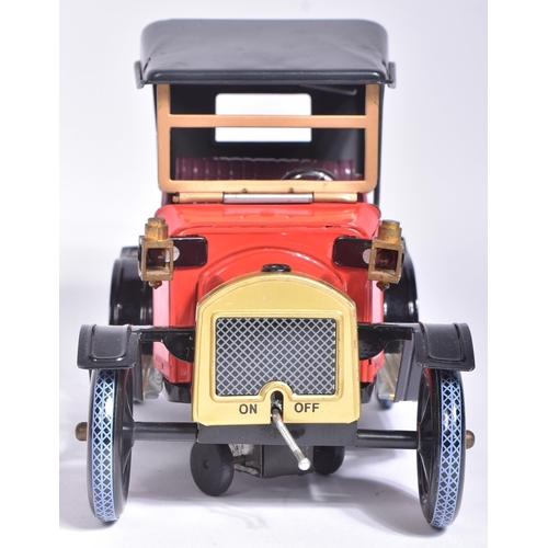 9 - Tinplate Toys - a vintage Japanese (Nomura) made tinplate battery operated model '  Veteran Car '. T... 